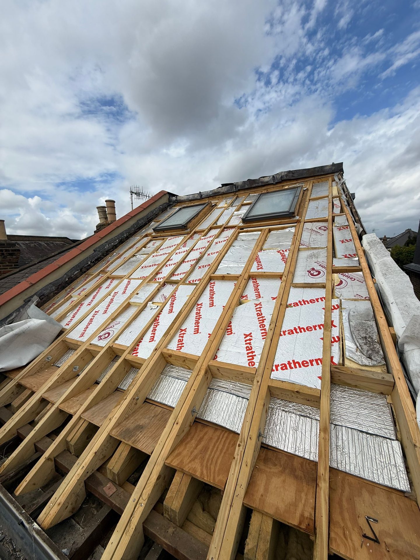 Insured roofing work in progress